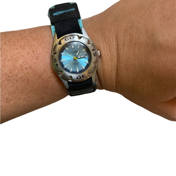 Teal around Face Arnette Analog Velcro Band Watch